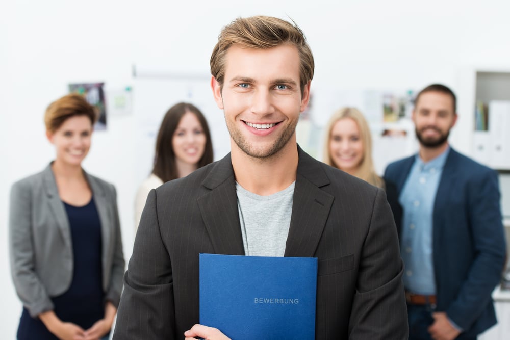 guy holding resume