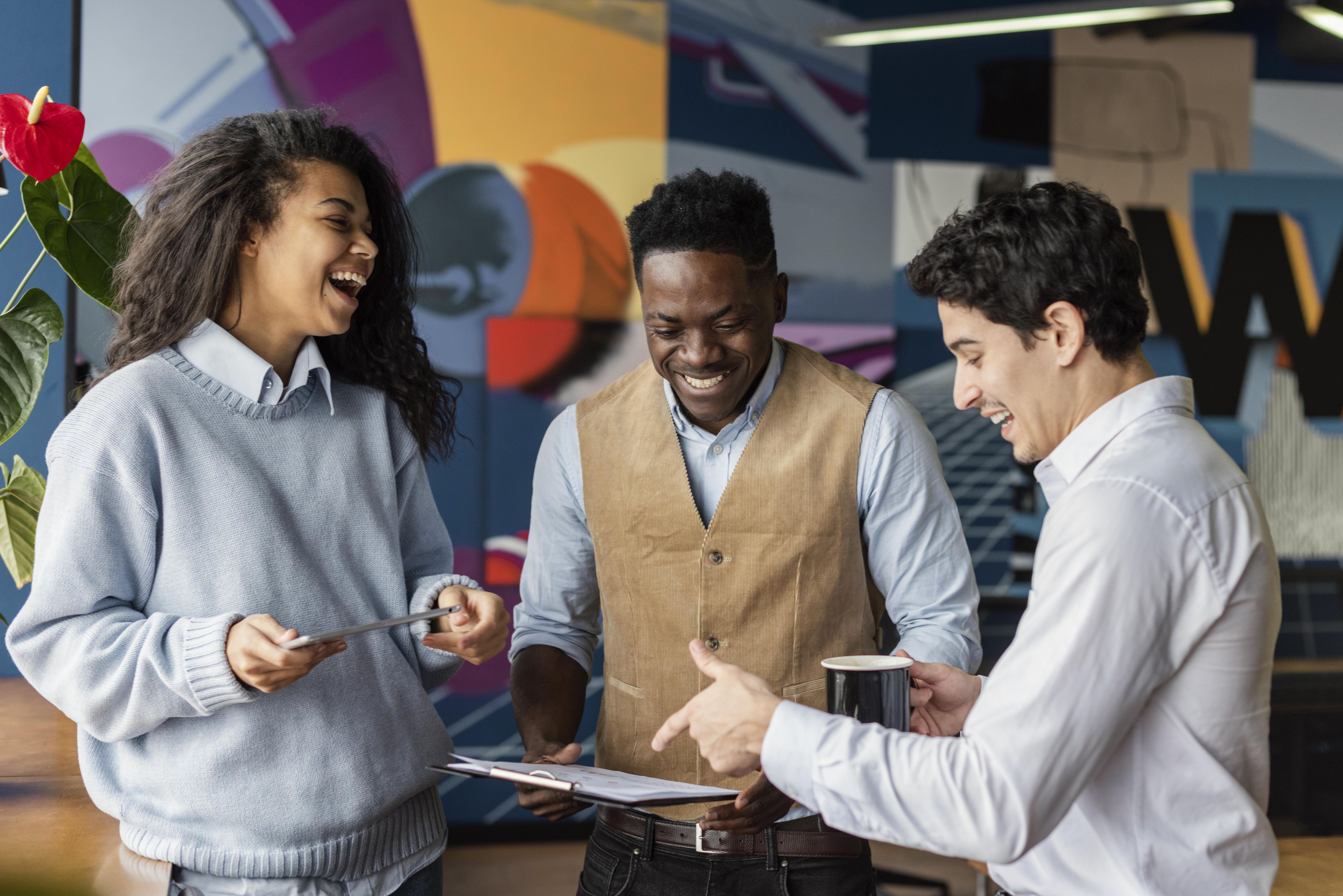 smiling coworkers chatting together